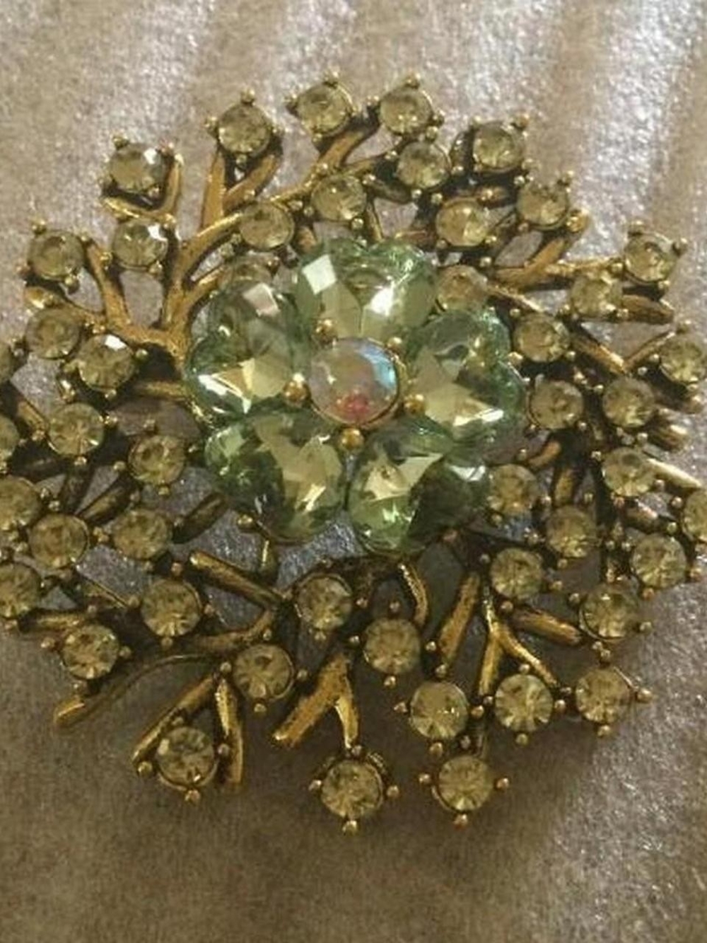 Vintage-Inspired Gold Floral Brooch with Light Green Crystals